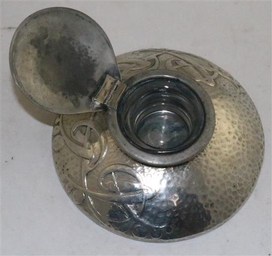 A Solkets English pewter inkwell, by Liberty & Co., in the manner of Archibald Knox, 5in.